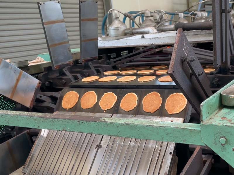 煎餅焼成機のタイミング調整